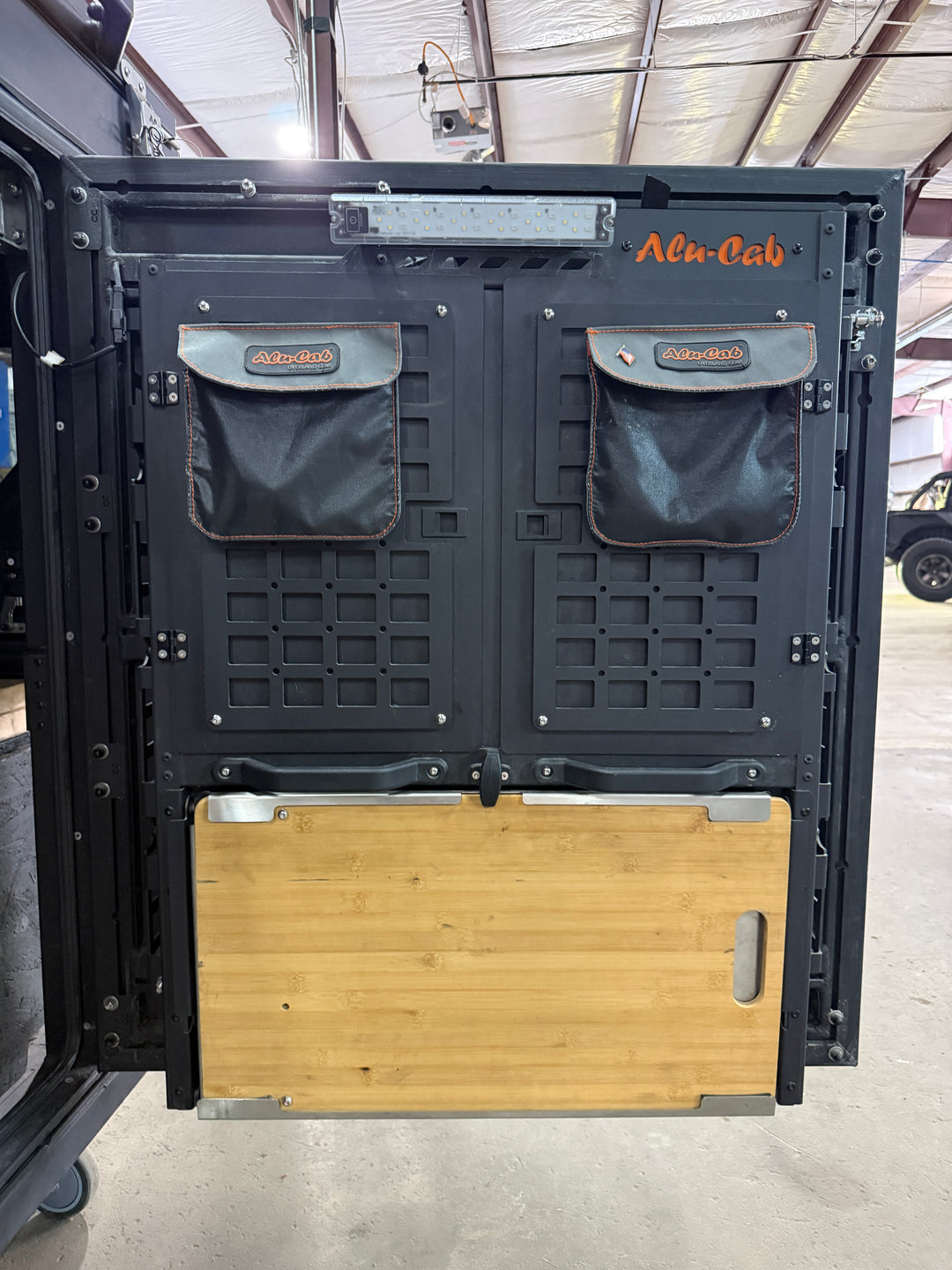 Pre-Owned Alu-Cab ModCAP Camper for 5' Mid Size Bed Trucks