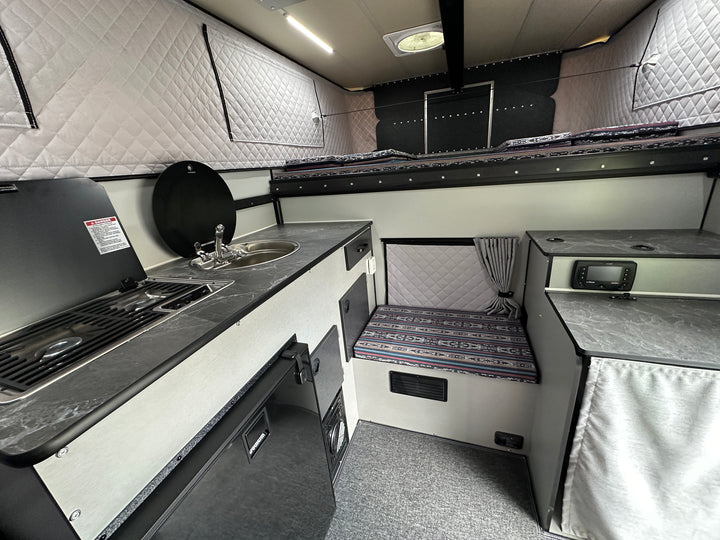 Pre-Owned Four Wheel Campers Grandby Flatbed Camper