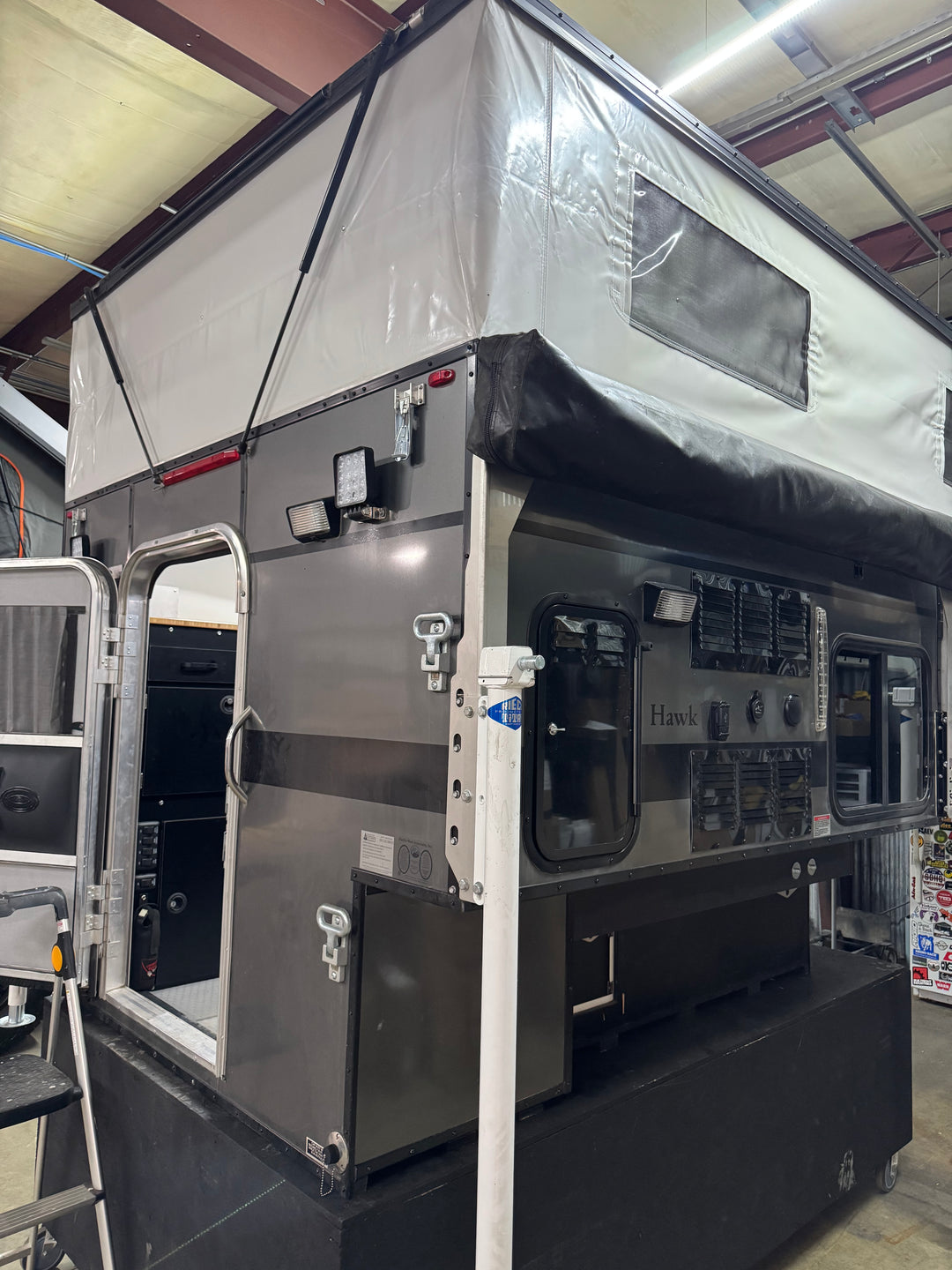 Pre-Owned Four Wheel Campers Hawk Front Dinette Camper