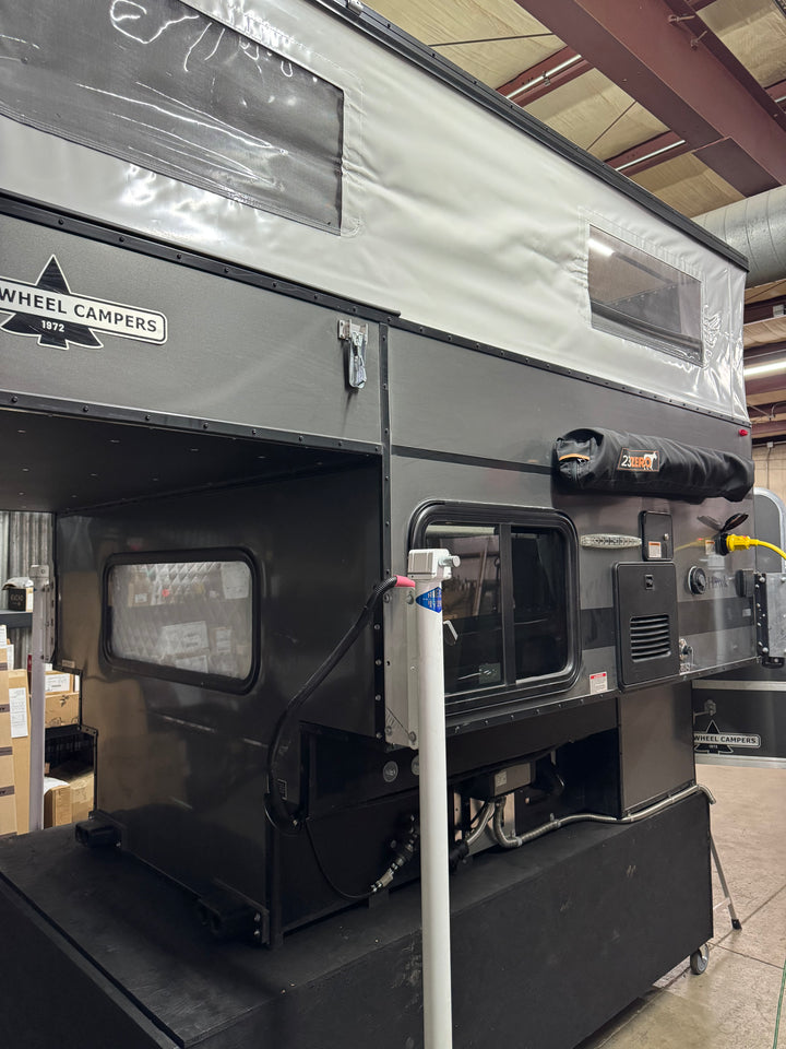 Pre-Owned Four Wheel Campers Hawk Front Dinette Camper