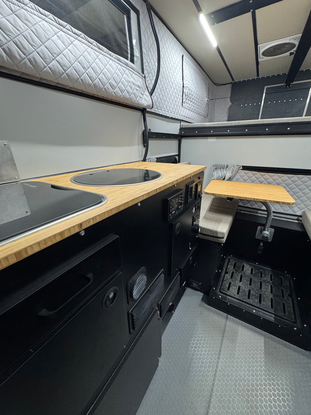 Pre-Owned Four Wheel Campers Hawk Front Dinette Camper