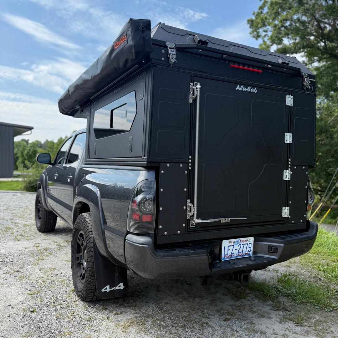 Pre-Owned Alu-Cab ModCAP Camper for 5' Mid Size Bed Trucks