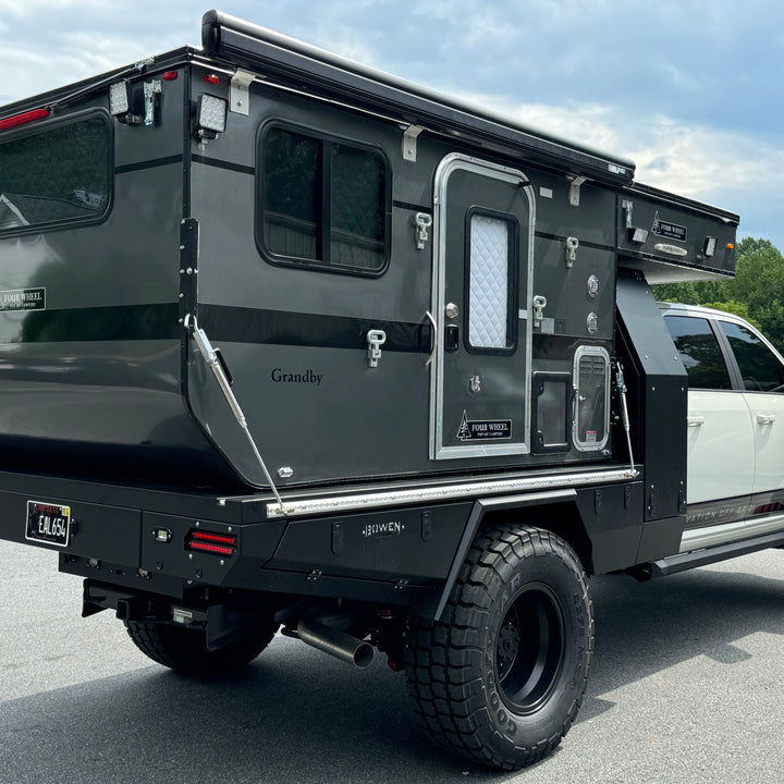 Pre-Owned Four Wheel Campers Grandby Flatbed Camper