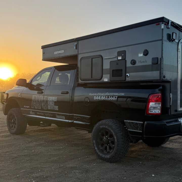 Pre-Owned Four Wheel Campers Hawk Front Dinette Camper