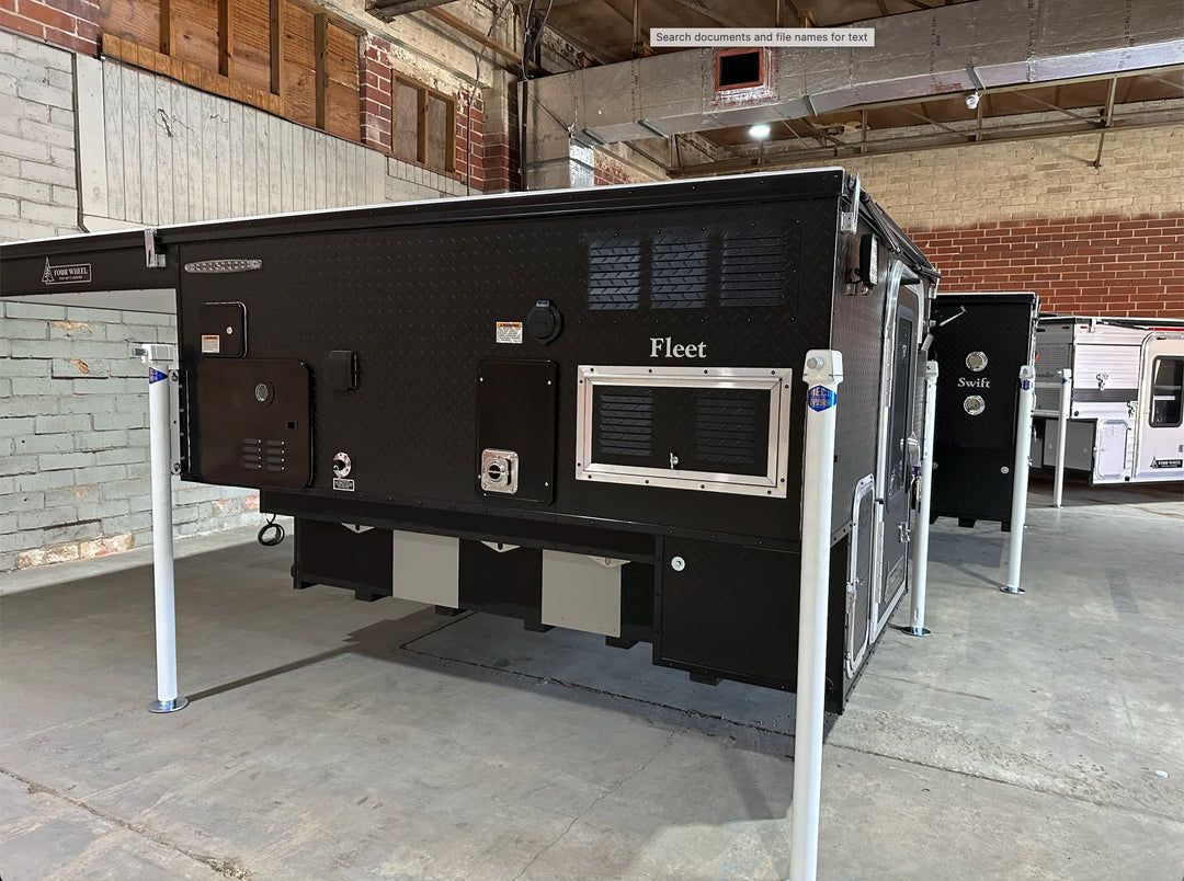 Pre-Owned Four Wheel Campers Fleet Side Dinette Camper