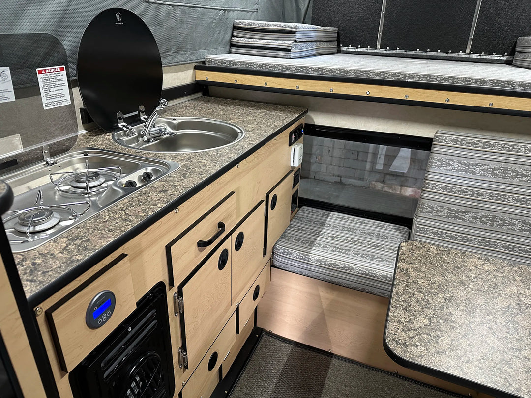 Pre-Owned Four Wheel Campers Fleet Side Dinette Camper