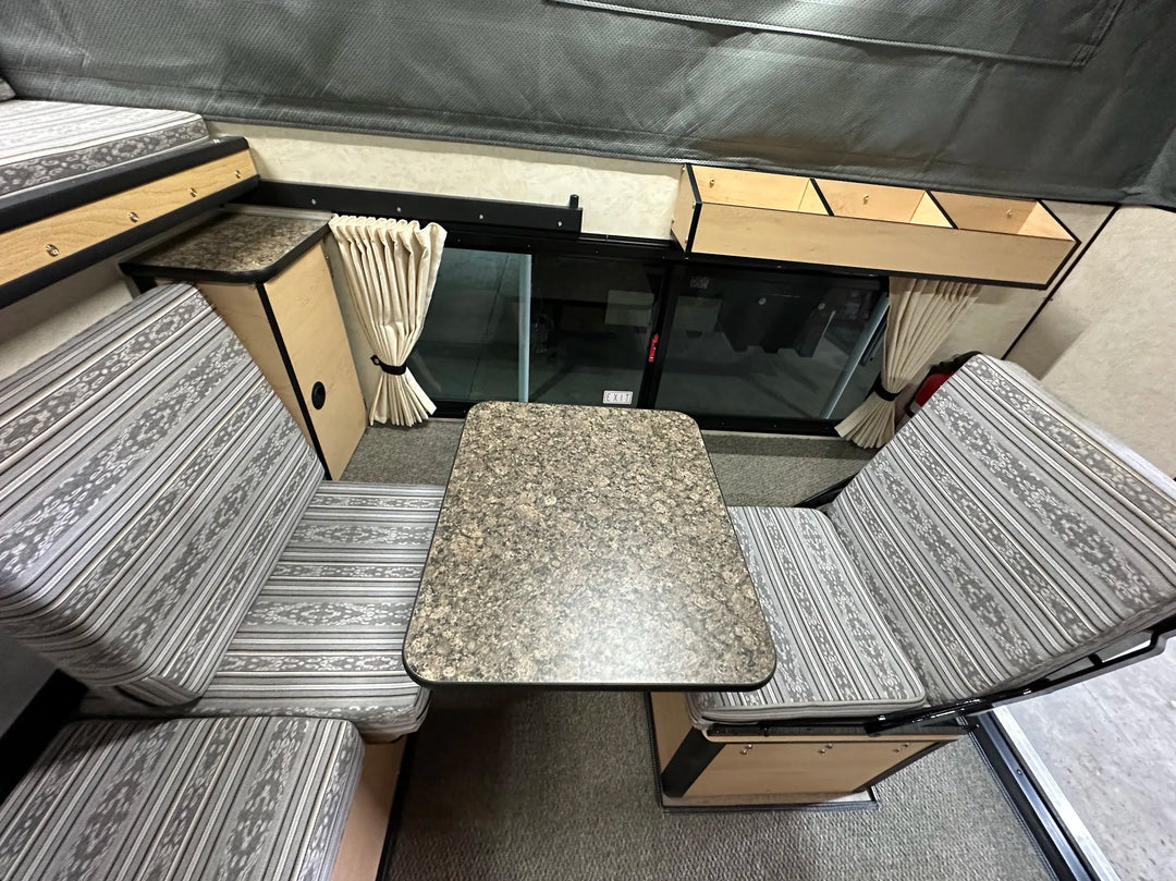 Pre-Owned Four Wheel Campers Fleet Side Dinette Camper